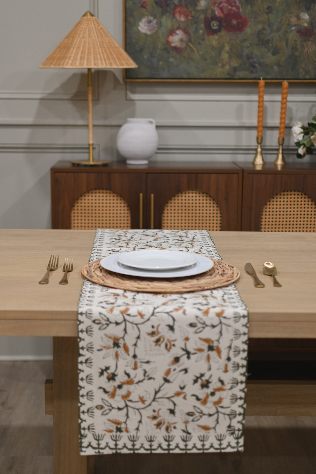 White and amber block printed table runner styled on a dining table