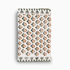 Hand block print table runner in white with otter brown floral buti pattern