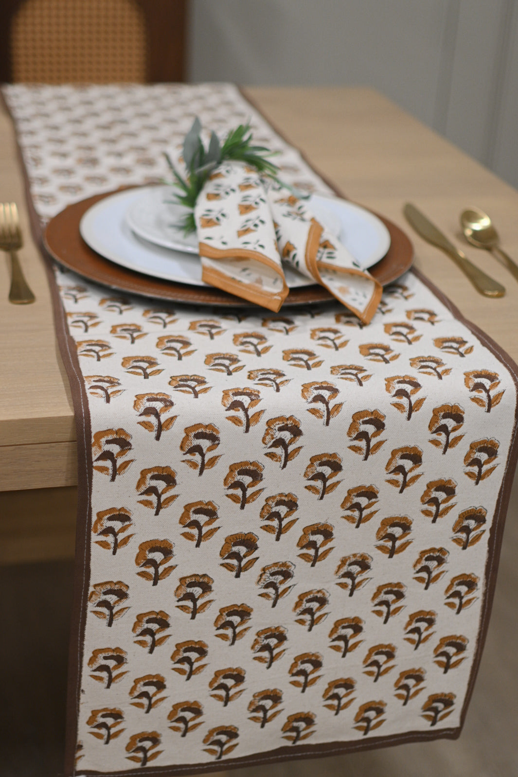 Hand block print table runner in white with amber gold floral buti pattern