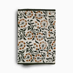 Hand block print table runner in white with green and gray floral pattern