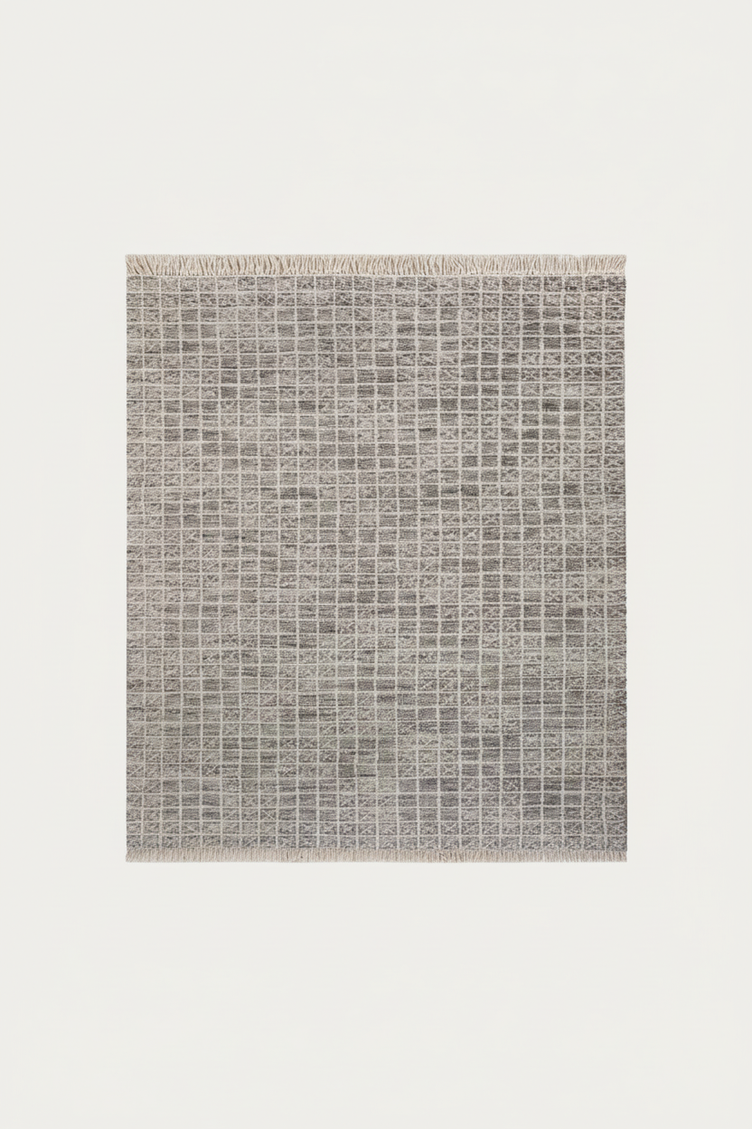 Textured gray rug with a subtle pattern on a white background